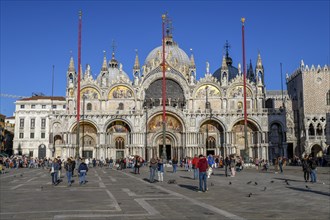 Tourists in front of the Basilica di San Marco, St. Mark's Cathedral, St. Mark's Square, Venice,