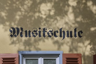 Grüner Hof, music school, lettering, facade, windows, shutters, Eningen unter Achalm,