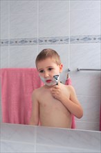 Boy, 4 years old, shaving, shaving foam