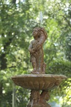 Detail with putto, putto, child and fish from the Florentine fountain in Nebbiensches garden shed,