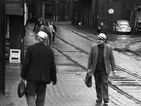 The Kloeckner Hasper Huette, shown here during a shift change on 27. 1. 1972 in Hagen, Germany, is