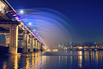 SEOUL, SOUTH KOREA, APRIL 7, 2017: Banpo Bridge Rainbow Fountain tourist landmark on Han river