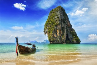 Tropical vacation holiday beach concept, Long tail boat on tropical beach, Krabi, Thailand, Asia