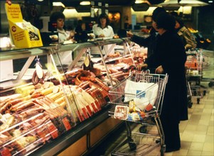 Dortmund. Customers shopping in a sopermarket in 1982 Meat and sausage products