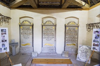 Crypt house with recovered grave slabs at the cemetery in Bad Muskau