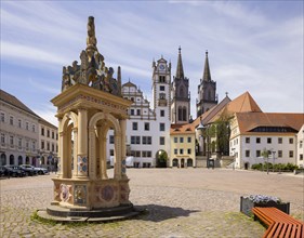 Oschatz market square with Renaissance fountain from 1578, Rathaius and St. Aegidien Church