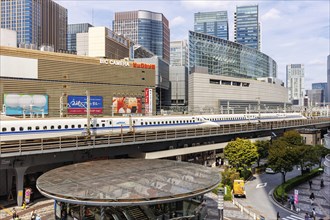 Shinkansen type N700 high-speed trains of Japan Rail JR train at Yurakucho station in Tokyo, Japan,