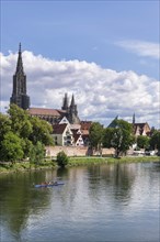 City view, Danube bank with historic old town, fishermen's quarter, cathedral, rowing boat, sports