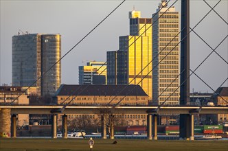 Düsseldorf, city centre skyline, skyscrapers, Rheinkniebrücke, Rhine, cargo ship