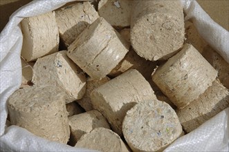 Firewood, wood briquette pressed from wood fibre