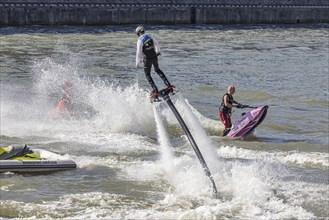 Harbour festival in Stuttgart. Spectacular jet ski and flyboard show on the Neckar. Stuttgart,