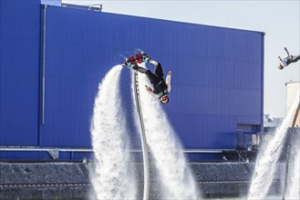 Harbour festival in Stuttgart. Spectacular jet ski and flyboard show on the Neckar. Stuttgart,