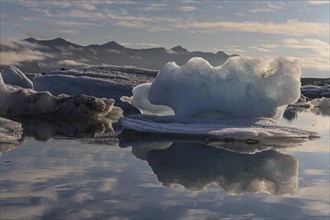 Ice floes, icebergs, reflection, sunny, Jökulsarlon, Iceland, Europe