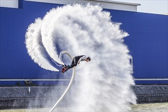 Harbour festival in Stuttgart. Spectacular jet ski and flyboard show on the Neckar. Stuttgart,