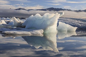 Ice floes, icebergs, reflection, sunny, fog, Jökulsarlon, Iceland, Europe