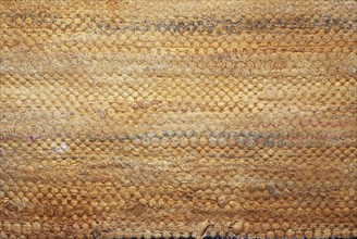 Original texture of a handmade woven runner, using old technology and modern design