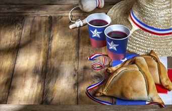 Food Photography, Chilean independence day concept. fiestas patrias. Tipical baked empanadas, wine