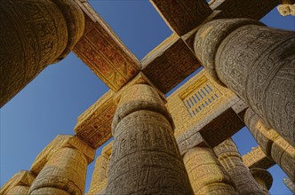 Columns in karnak temple with ancient egypt hieroglyphics, HDR image