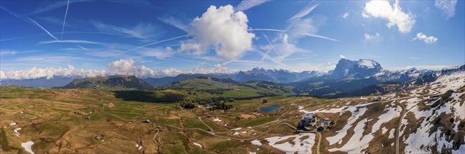 Panoramic view from the Seiser Alm to the Dolomites in Italy, drone shot