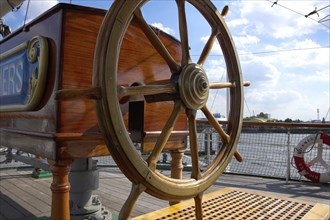 The steering wheel of the historical ship Rickmer Rickmers, which lays in the harbour of Hamburg,