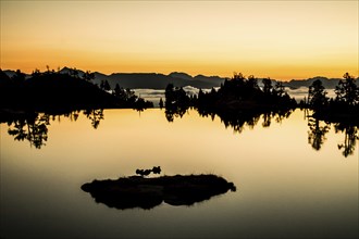 Sunrise lake in the Spanish Pyrenees, located at mountain hut JM Blanc, Aigüestortes i Estany de