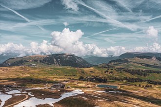 Panoramic view from the Seiser Alm to the Dolomites in Italy, drone shot