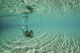 Snorkelling in lagoon, Fadol, Kai Islands, Moluccas, Indonesia, Asia