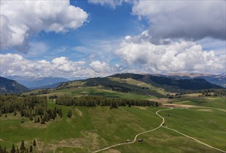 Panoramic view from the Seiser Alm to the Dolomites in Italy, drone shot