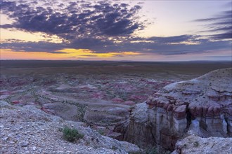 Textural colorful striped canyons Tsagaan suvarga (White stupa) at sunrise. Ulziit soum, Dundgovi