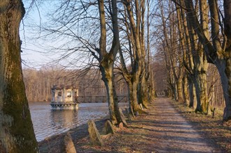 Alley on the lake, old observation deck on the pond, observation gazebo on the lake, Kolosovka