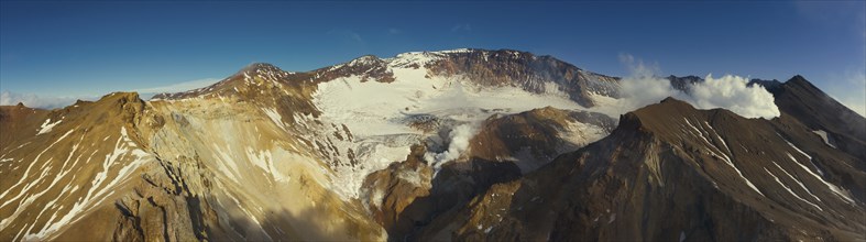 Aerial panorama of crater with fumaroles of active Mutnovsky volcano, Kamchatka, Russia, Europe