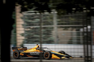 PATO OWARD (5) of Monterey, Mexico runs through the streets during the Honda Indy Toronto in