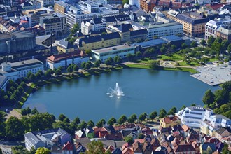 Lille Lungegårdsvannet surrounded by buildings, green park and streets, Fløibanen mountain station,