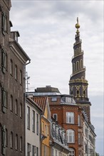 Historic houses, corkscrew-shaped tower of the Evangelical Lutheran Church of the Saviour, in front