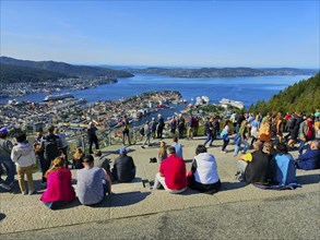 View of the city of Bergen with fjord, Bergen and a crowd of people admiring the scenery, Fløibanen