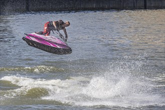 Harbour festival in Stuttgart. Spectacular jet ski and flyboard show on the Neckar. Stuttgart,