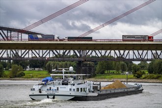 The Beeckerwerth Rhine bridge of the A42 motorway, truck traffic, behind it the Haus-Knipp railway