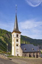 St Laurentius Church under a blue sky with cirrus clouds in Bremm, Cochem-Zell district,