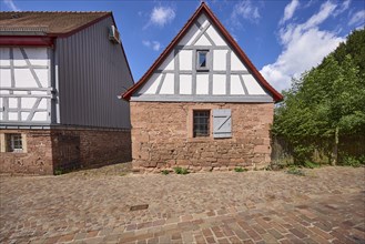 Small half-timbered house on a stone plinth on Hochstraße in Michelstadt, Odenwald, Odenwaldkreis,