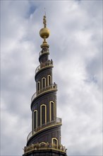 Corkscrew-shaped tower of the Evangelical Lutheran Church of the Saviour, in front of Frelsers