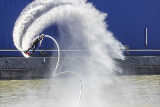 Harbour festival in Stuttgart. Spectacular jet ski and flyboard show on the Neckar. Stuttgart,