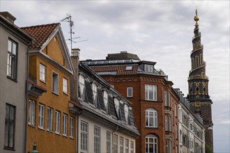 Historic houses, corkscrew-shaped tower of the Evangelical Lutheran Church of the Saviour, in front