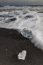 Ice floes, beach, sea, waves, clouds, Diamond Beach, Breidamerkursandur, Jökulsarlon, Iceland,