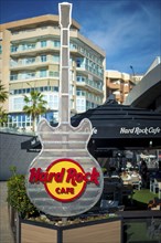 Malaga, Spain, April 2023: View on outdoors guitar of the Hard Rock Cafe in Malaga, Spain, Europe