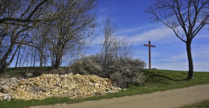 Fieldstone camp and wayside cross on the Swabian Alb, Baden-Württemberg, Germany, Fieldstone camp