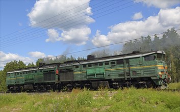 Old rusted diesel locomotive train on railway