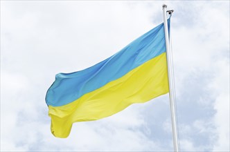 Ukrainian flag on flagpole