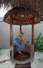 Shower in open-plan bathroom, Maldives, Indian Ocean, Medhufushi, Meemu Atoll, Asia