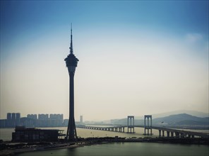 Macau tower urban landmark skyline and taipa bridge in macao china