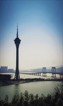 Macau tower urban landmark skyline and taipa bridge in macao china